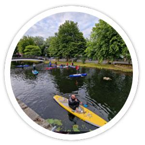 Staff based in Newry use paddleboards to collect litter from the canal which runs past the station.