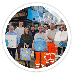 Translink staff help load buses with aid items to help with Ukraine crisis