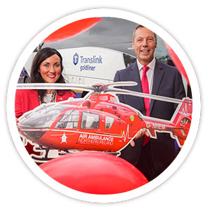 Translink and Air Ambulance staff celebrate partnership with red balloons